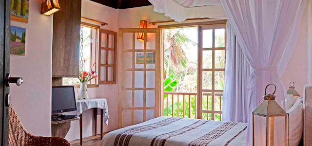 Quarto Coruja no Butterfly House Bahia